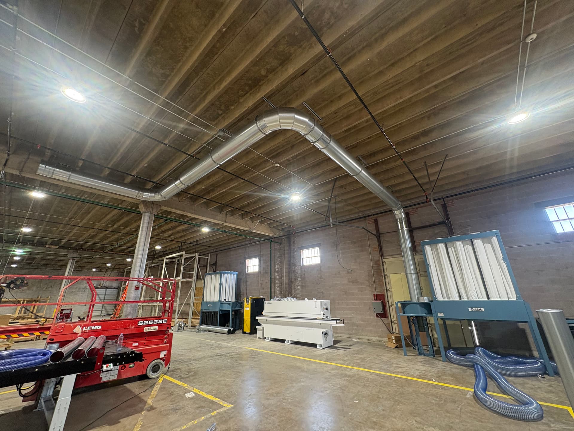Commercial Ventilation Ductwork Installation in a Large Industrial Facility image